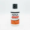 Vue de face du flacon transparent d'acétone pure Nina 500 ml, bouchon coloré et étiquette claire pour cosmétique.