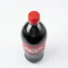 Vue de dessus de la bouteille d'AMERICAN COLA 125CL, montrant son bouchon rouge et sa boisson noire dans un contenant plastique.