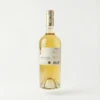 CARILLONADE BLANC BDX 75 CL, bouteille de vin blanc doré en verre transparent, vue de face avec son étiquette blanche et or.