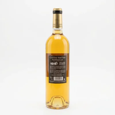 Vue arrière de la bouteille CHATEAU MAUTAIN MONTBAZILLAC BLANC 75CL, montrant son vin doré à travers le verre transparent.
