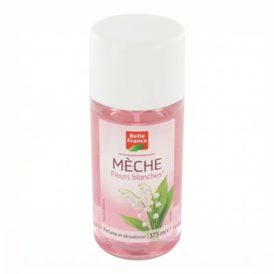 Vue de dessus du flacon Fleur Blanche avec mèche apparente.