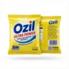 Détergent Ozil Ultra Power 100g dans son sachet jaune vif, vue de face, avec logo Color Guard et infusion au citron.