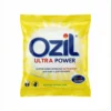 Vue de face du détergent Ozil Ultra Power 25g dans son sachet en plastique jaune, avec le logo bleu et l'indication Color Guard.