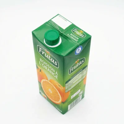 Vue dessus bouchon bouteille jus orange Frutas pratique