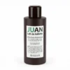 Flacon Juan Elixir lait de toilette 300ml posé devant.