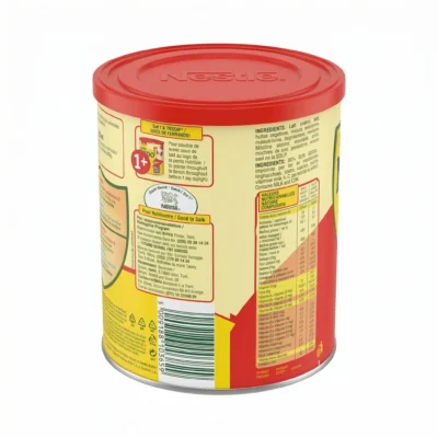 Vue arrière de la boîte métallique jaune de lait en poudre Nido 1+ avec son couvercle rouge et les informations nutritionnelles.
