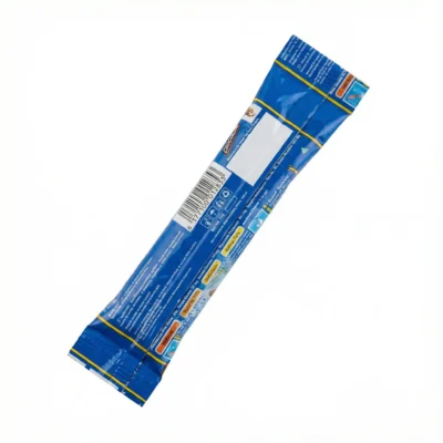 Vue arrière du MATINAL STICK 10G dans son sachet plastique bleu et jaune de forme allongée.