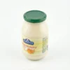 Vue de dessus de la MAYONNAISE ARMANTI 500g dans son bocal en verre avec un couvercle vert et une étiquette jaune.