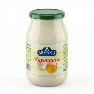MAYONNAISE ARMANTI 500g dans son bocal en verre au couvercle vert, en vue de latérale sur fond blanc.