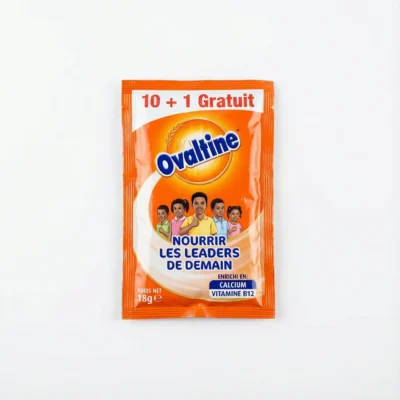 Vue de dessus du sachet rectangulaire orange d'OVALTINE EN SACHET 18 g, avec l'inscription '10 + 1 Gratuit' en français.