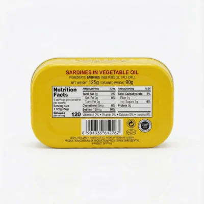 Vue arrière de la conserve métallique jaune de SARDINE SO NICE PIMENTEE 125G affichant les informations nutritionnelles.
