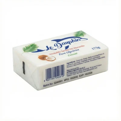 Vue de côté du SAVON LE DAUPHIN COCONUT 175G, un pain rectangulaire blanc sous emballage plastique transparent et bleu.