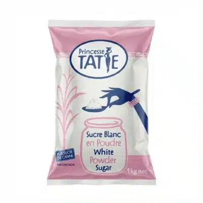 Vue de face du sachet de SUCRE SOSUCAM 1kg BLANC, emballage plastique rose et blanc avec des illustrations bleues et roses.