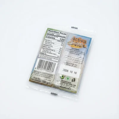 Vue arrière du sachet transparent de SUCRE VANILLE ACTIVA 11G, montrant l'étiquette nutritionnelle sur un fond blanc.