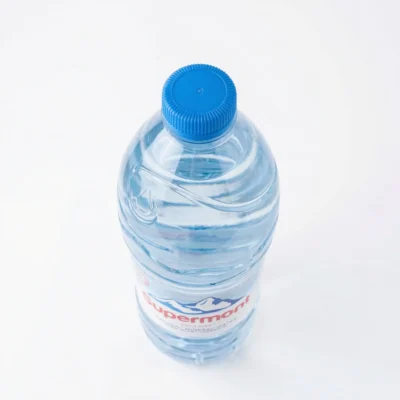 Vue dessus bouchon Supermont scellé garantie hygiène source