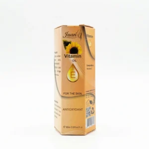 Flacon de vitamine E Juan 60ml posé devant fond neutre.